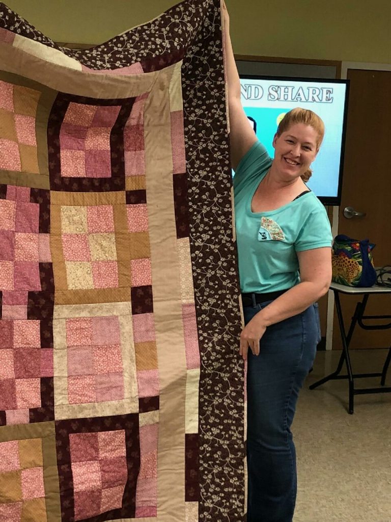 Liz Mills made the above quilt using leftover bits collected from the A to Z Quilters members. The quilt was donated to Arizona Helping Hands, which provides needed items to foster children. The quilt top and the quilting were done on a 1980's Singer Model 6233.﻿